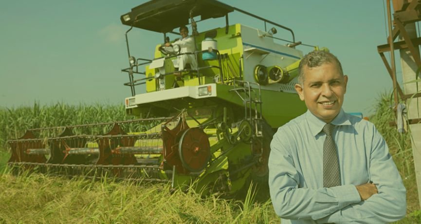 Satisfied farmer with VISHAL Paddy Combine Harvester